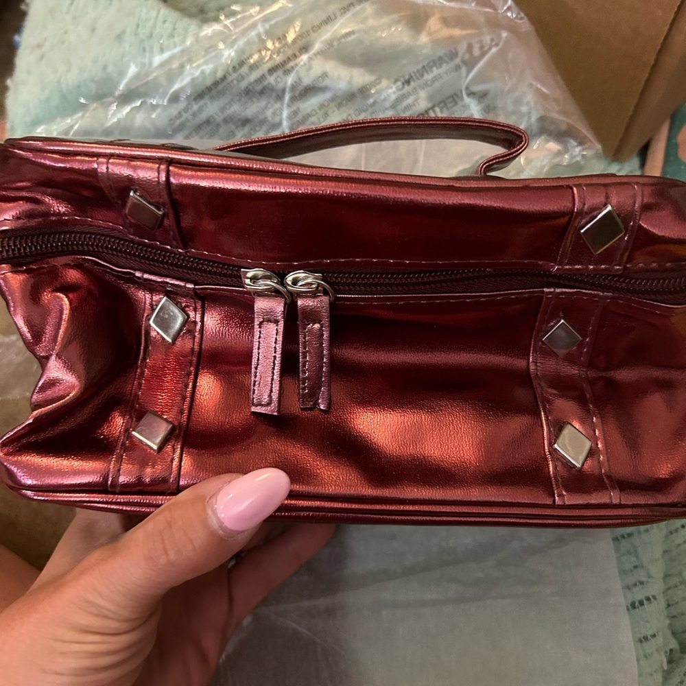 Vintage Avon Cosmetic Bag. Beautiful metallic red color. New